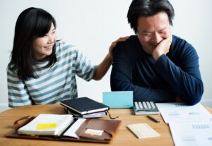 Couple-Planning-their-Finances-and-looking-at-Documents